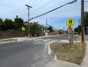 A raised crossing near a school.