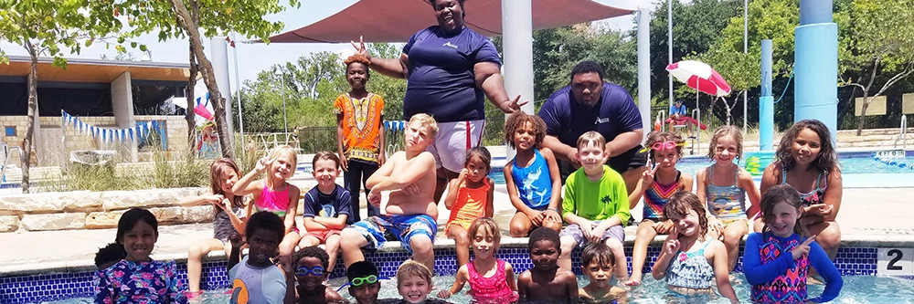 group of kids and counselors at the pool