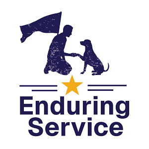 Silhouette graphic of a man kneeling with a flag waving above him as he shakes a dog's paw.  
