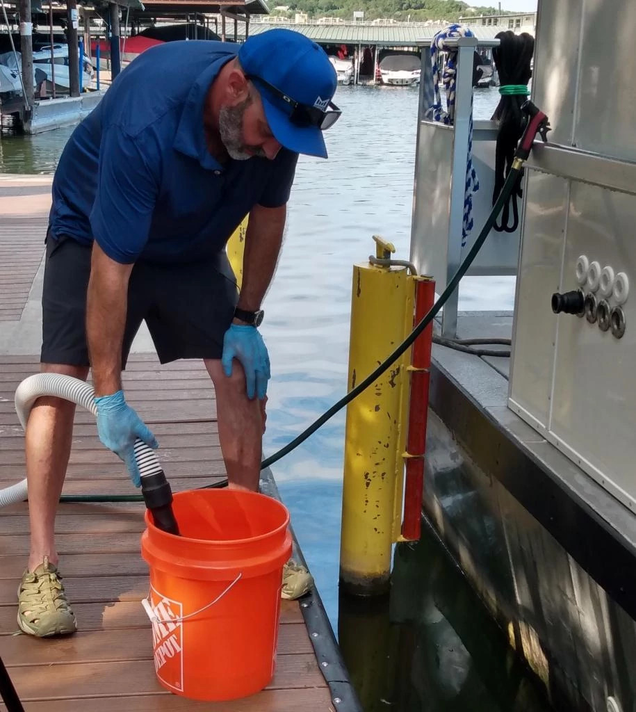 Step 9_Cleaning Hose in Bucket.jpg
