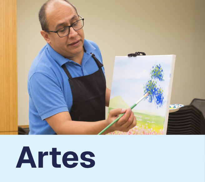 Thumbnail of man teaching how to paint