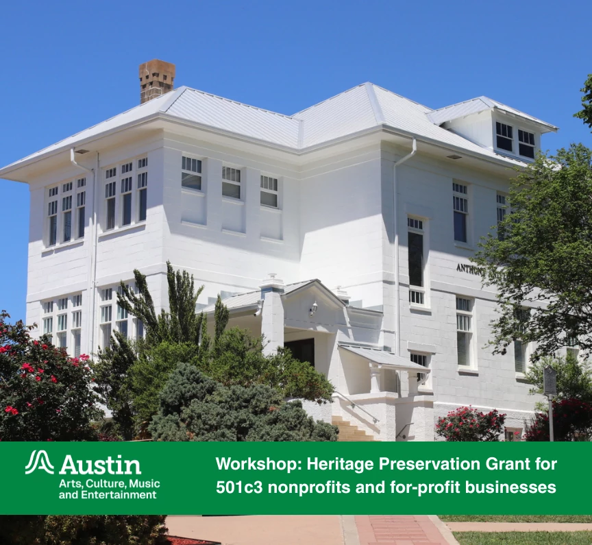 Historic white building with a flat roof and multiple windows, surrounded by green shrubs and colorful flowers, with text overlay about a Heritage Preservation Grant workshop and ACME Logo.