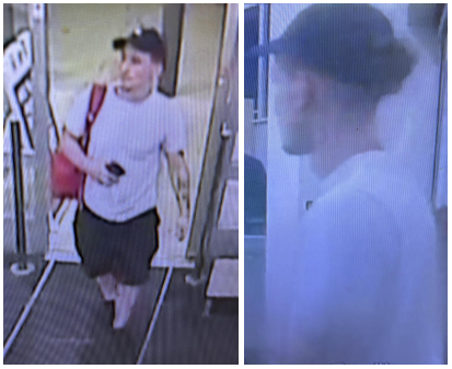 male suspect walking into business