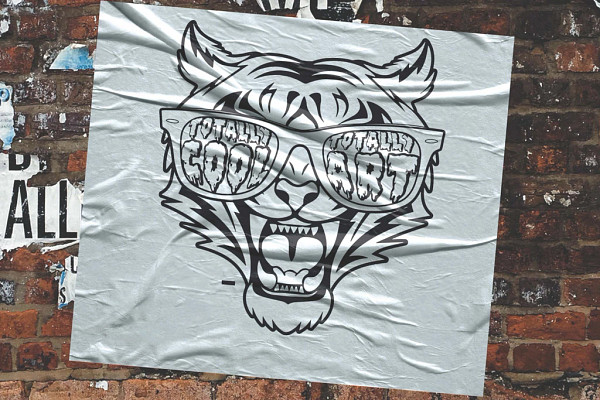An image of a brick wall with a poster on it of a tiger wearing sunglasses that have the words 'Totally Cool Totally Art' on them
