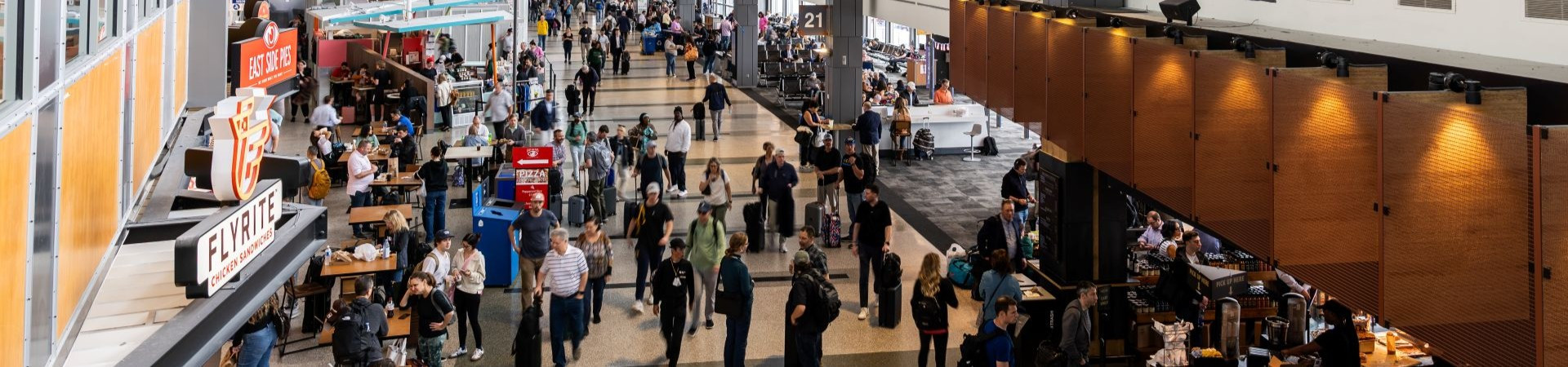 Stores, restaurants, and patrons inside the Austin airport