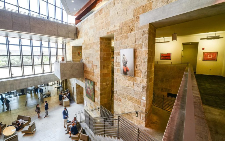 View of art on the walls of Austin City Hall for the People's Gallery exhibit