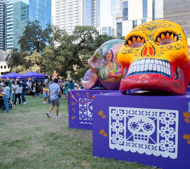 Large painted skulls installation at Republic Square