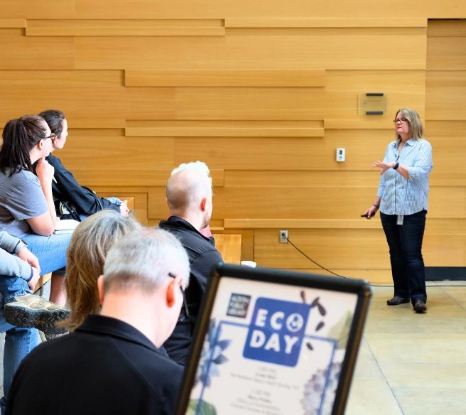 A staff member from Austin Climate Action and Resilience gives a presentation at the Central Library.