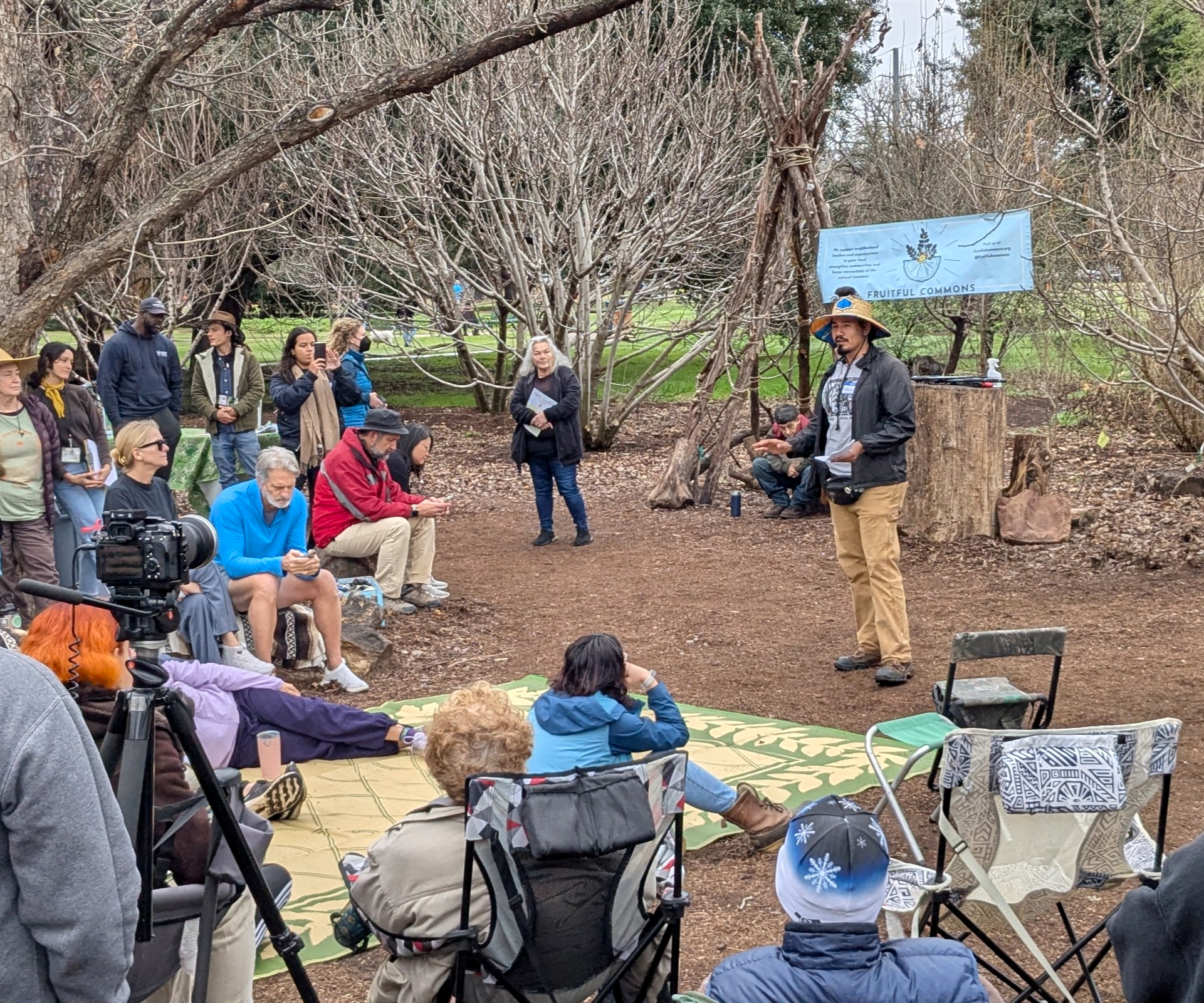 A man speaks to participants at tree health workshop