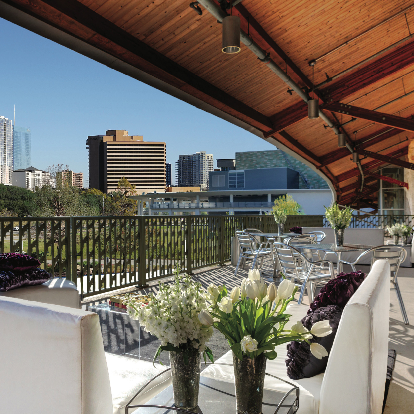 Image of the balcony at the Palmer Events Center overlooking Lady Bird Lake Town Lake and the Austin skyline