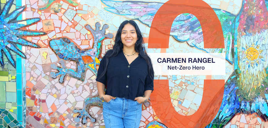 Carmen Rangel stands in front of a large mosaic. Text reads, Carmen Rangel, Net-Zero Hero.