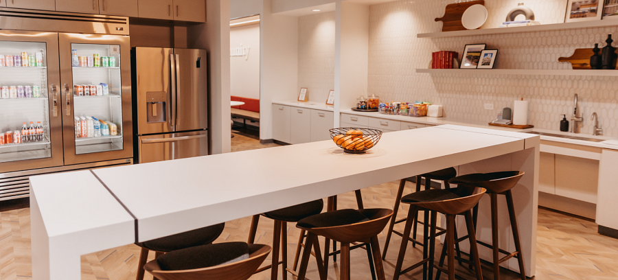 The kitchen at Parkhill's Austin office, offering healthy snacks and open seating.