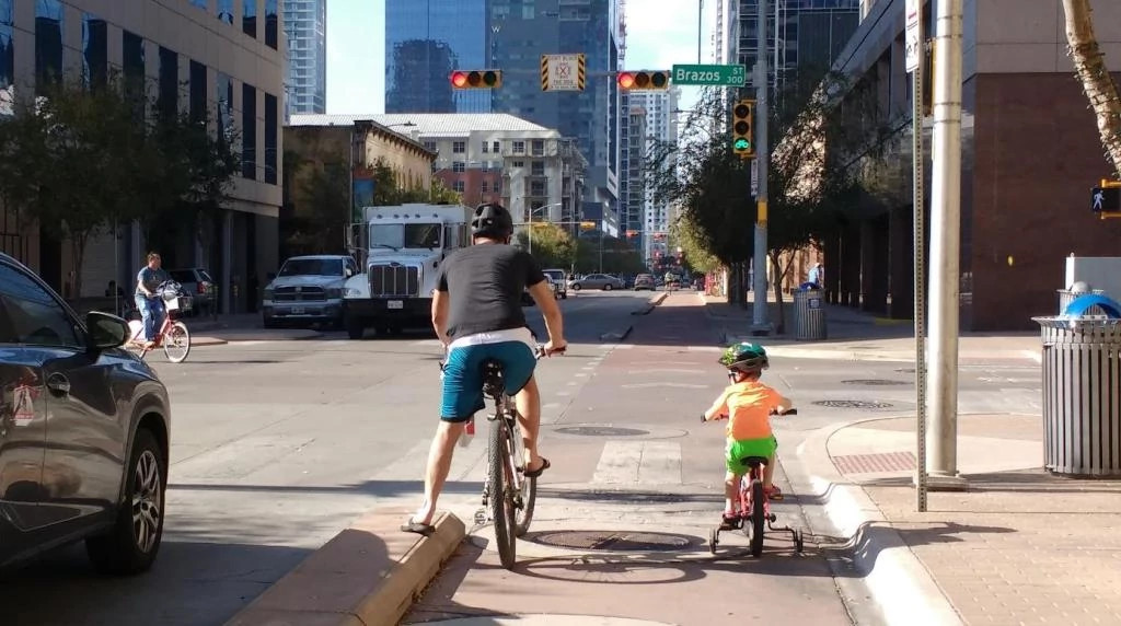 dad and kid on bikes.jpg
