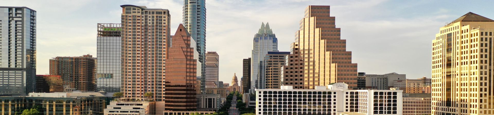 View down Congress Street in downtown Austin with the State Capitol in the distance