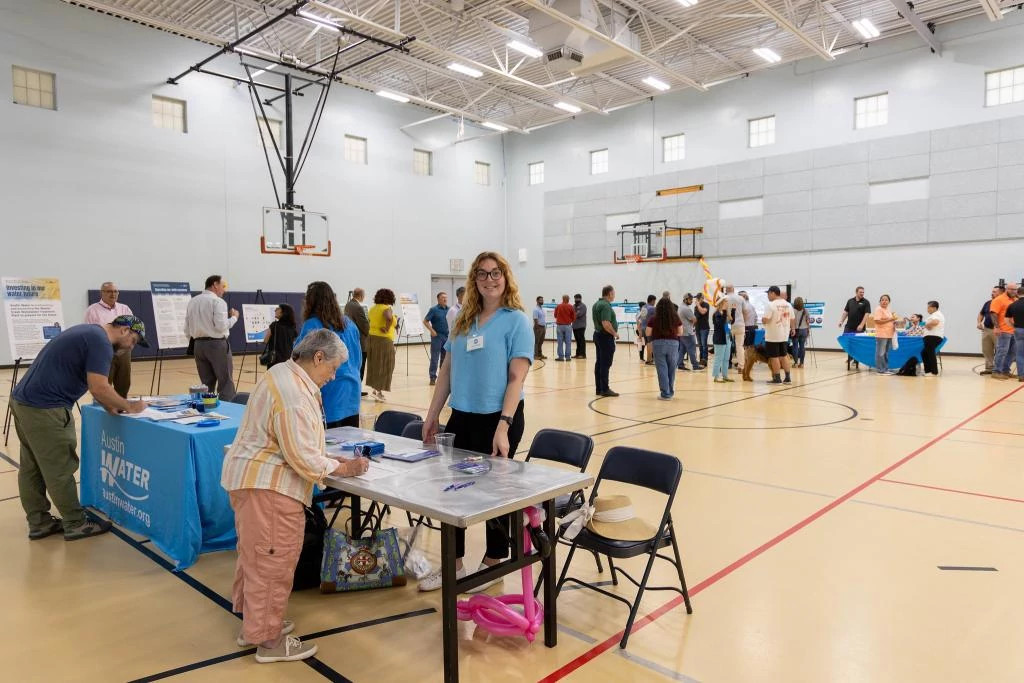 A view of visitors and city staff at a public meeting for the Walnut Creek Project