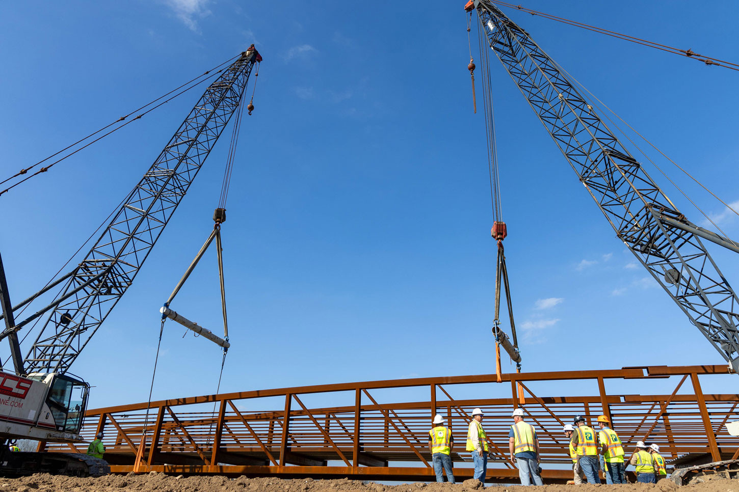 Installation of the new pedestrian bridge was a key project milestone. Stretching 164 feet, this steel prefabricated bridge is built for long-term stability. It rests on six deep piers ranging from 40 to 51 feet. 