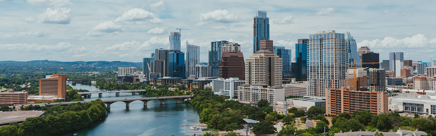 Banner with view of Austin downtown with the river and bridges