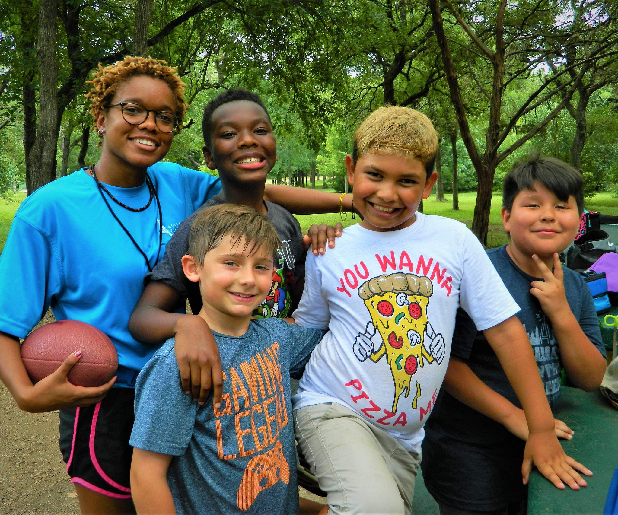 A group of children at a picnic table