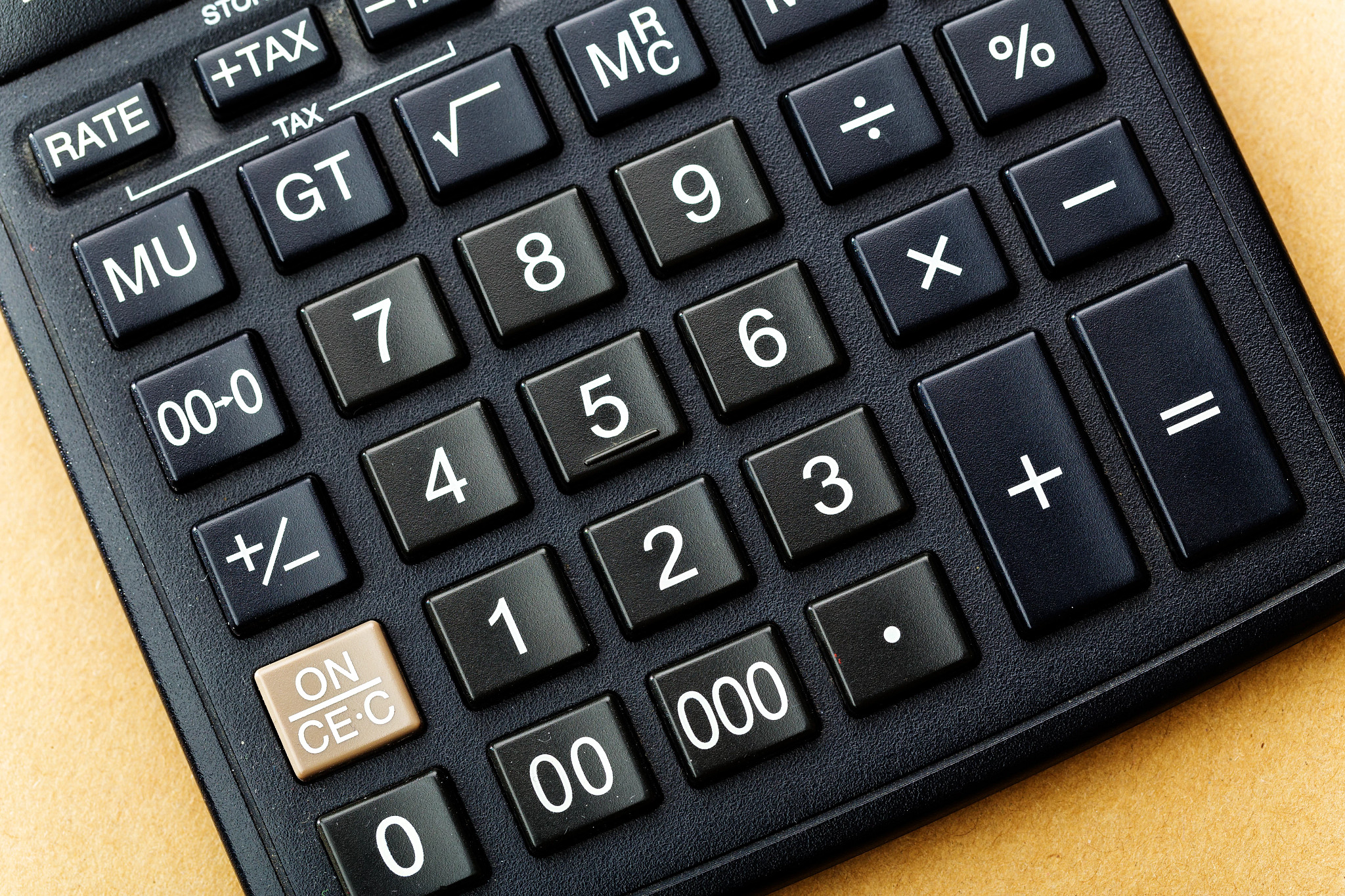 photo of a calculator on a desk