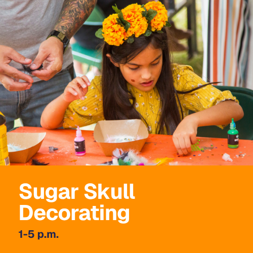 photo of girl decorating a sugar skull