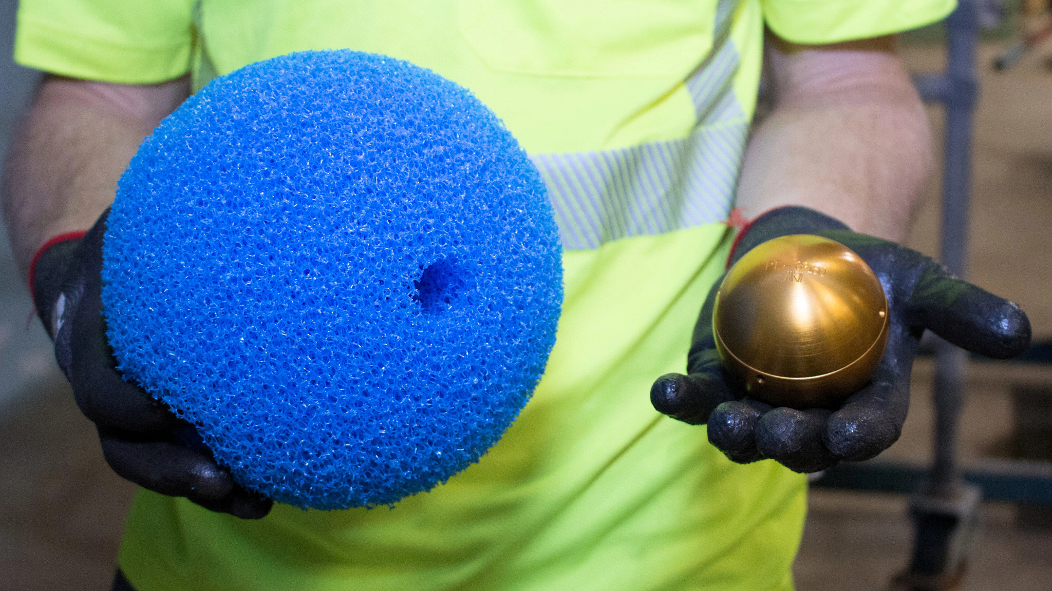 Austin Water crews show off the SmartBall leak detection tool.