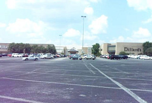A parking lot with zero tree coverage baking in the sun. 
