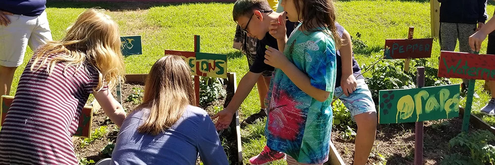 children working in garden