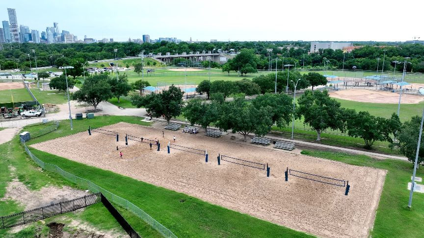 People playing sand volleyball at Krieg Athletic Complex, Austin, TX