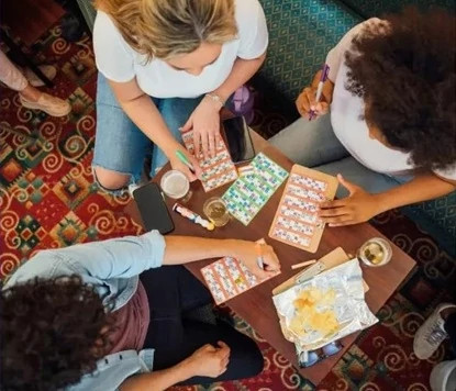 ladies sharing a table playing bingo