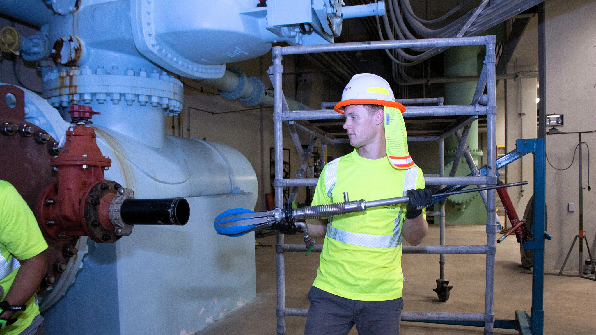 Austin Water crews show off the SmartBall leak detection tool.