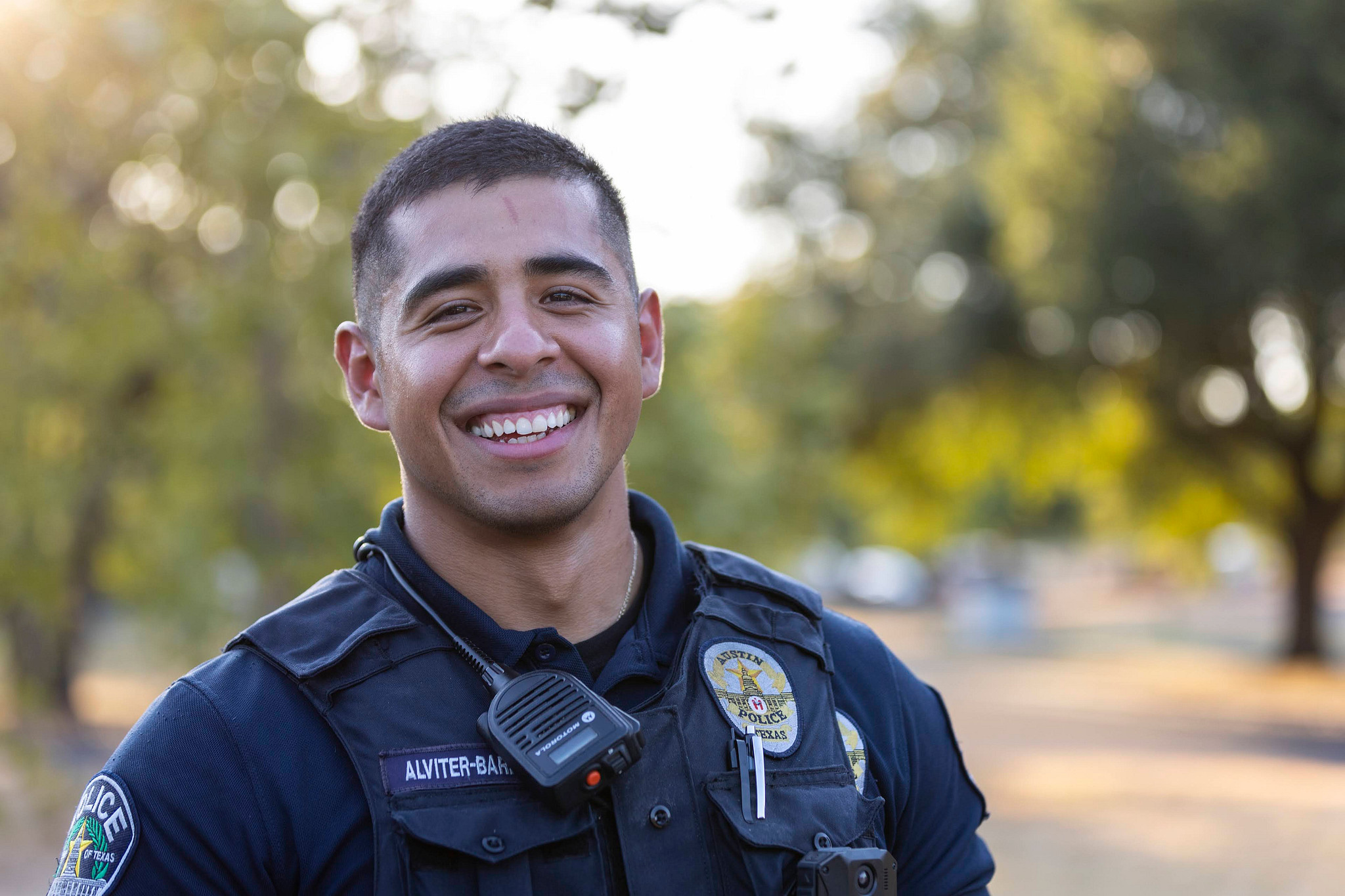A smiling Austin Police Officer.