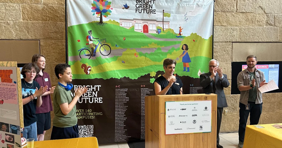 Elizabeth Harper introducing Mayor Kirk Watson at the 9th Annual Central Texas Student Innovation Showcase.