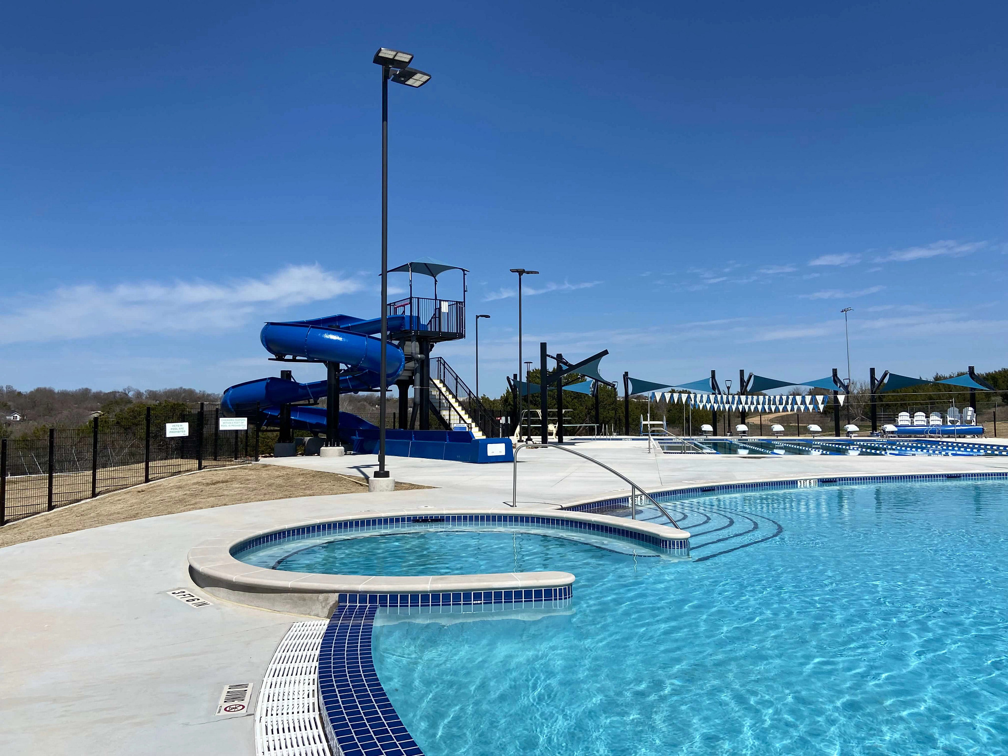 Colony Park Pool before its grand opening in 2025, highlighting the water slide and family pool