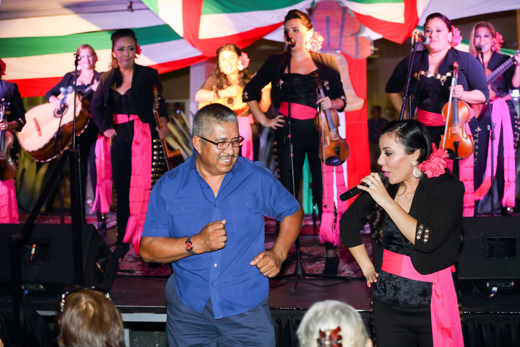 ESB MACC Viva Mexico People dancing excitedly to Mexican music and decor