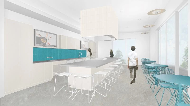 A rendering of the teaching kitchen with furniture including counters, tables and chairs