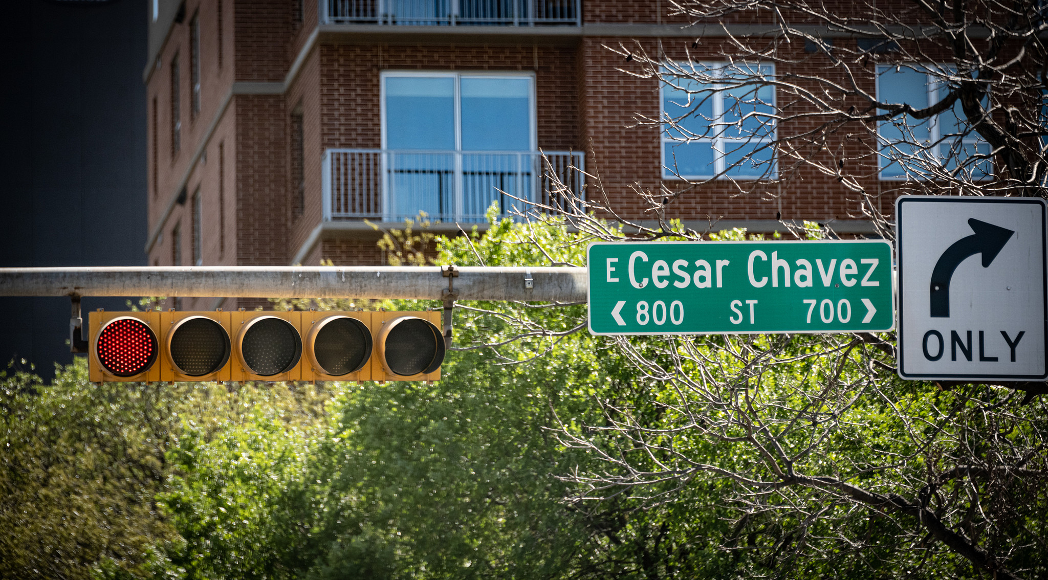 A sign for Cesar Chaves St, in downtown Austin, Texas.