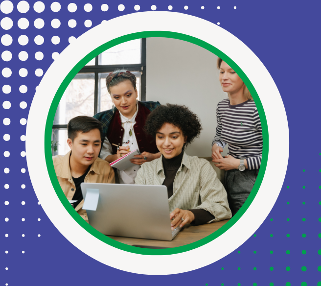 professionals gathered around a laptop computer