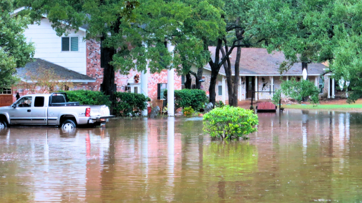 Photo of house and floodwaters