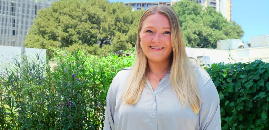 Molly Ellsworth smiles at the camera.