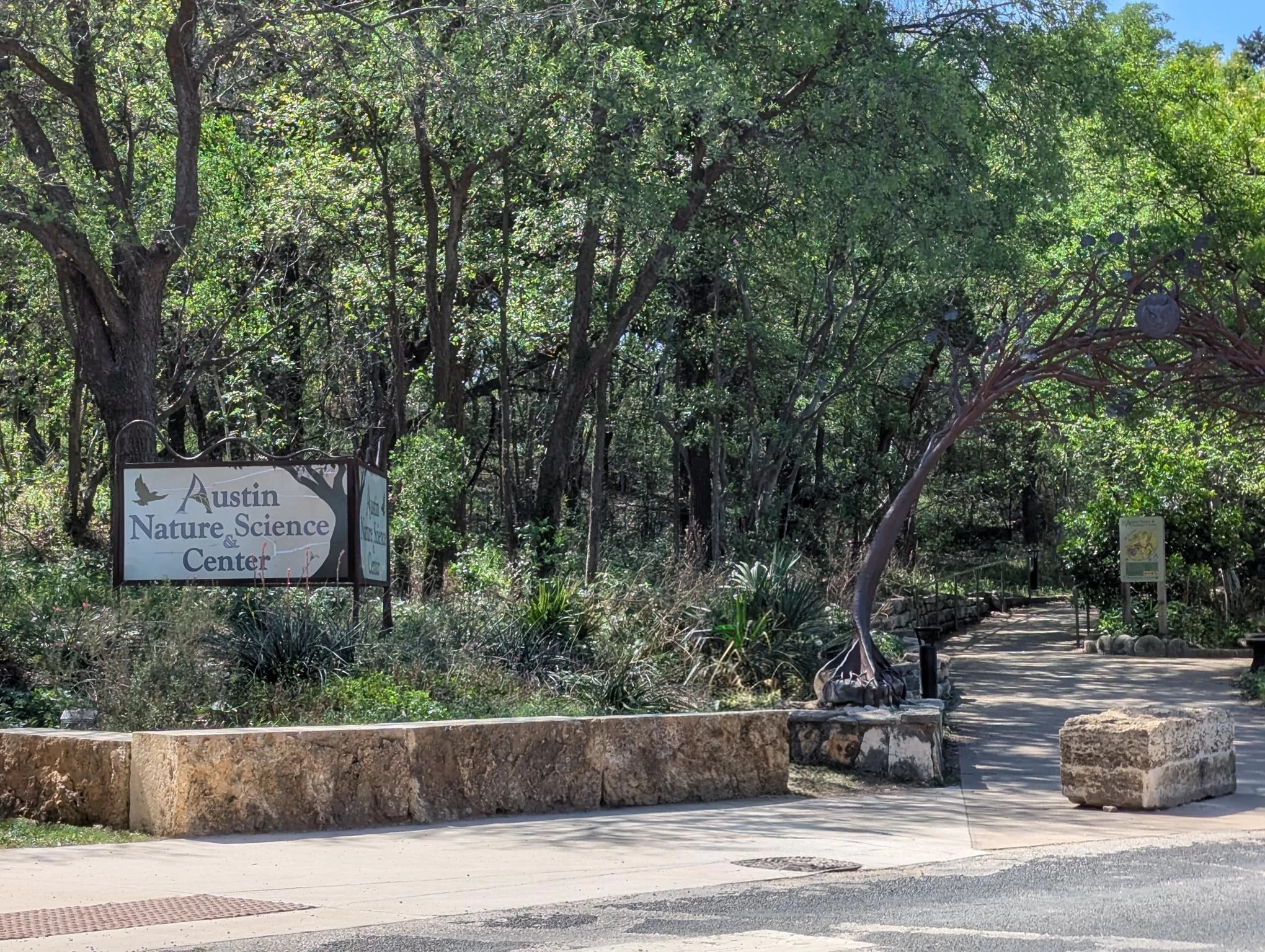 Entrance archway with Austin Nature and Science Sign
