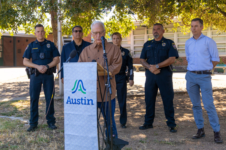 Photo of Mayor Kirk Watson, officials from the City of Austin and Austin Independent School District gathered at Lamar Middle School.