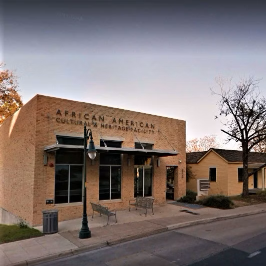 Outside of African American Cultural and Heritage Facility at sunset