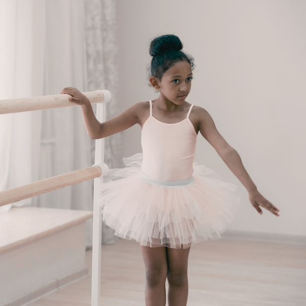 image of ballerina at barre in tutu