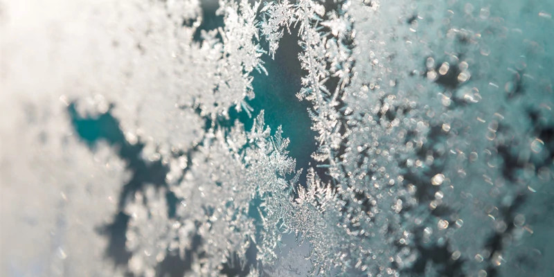 A photo showing frost on a pane of glass.