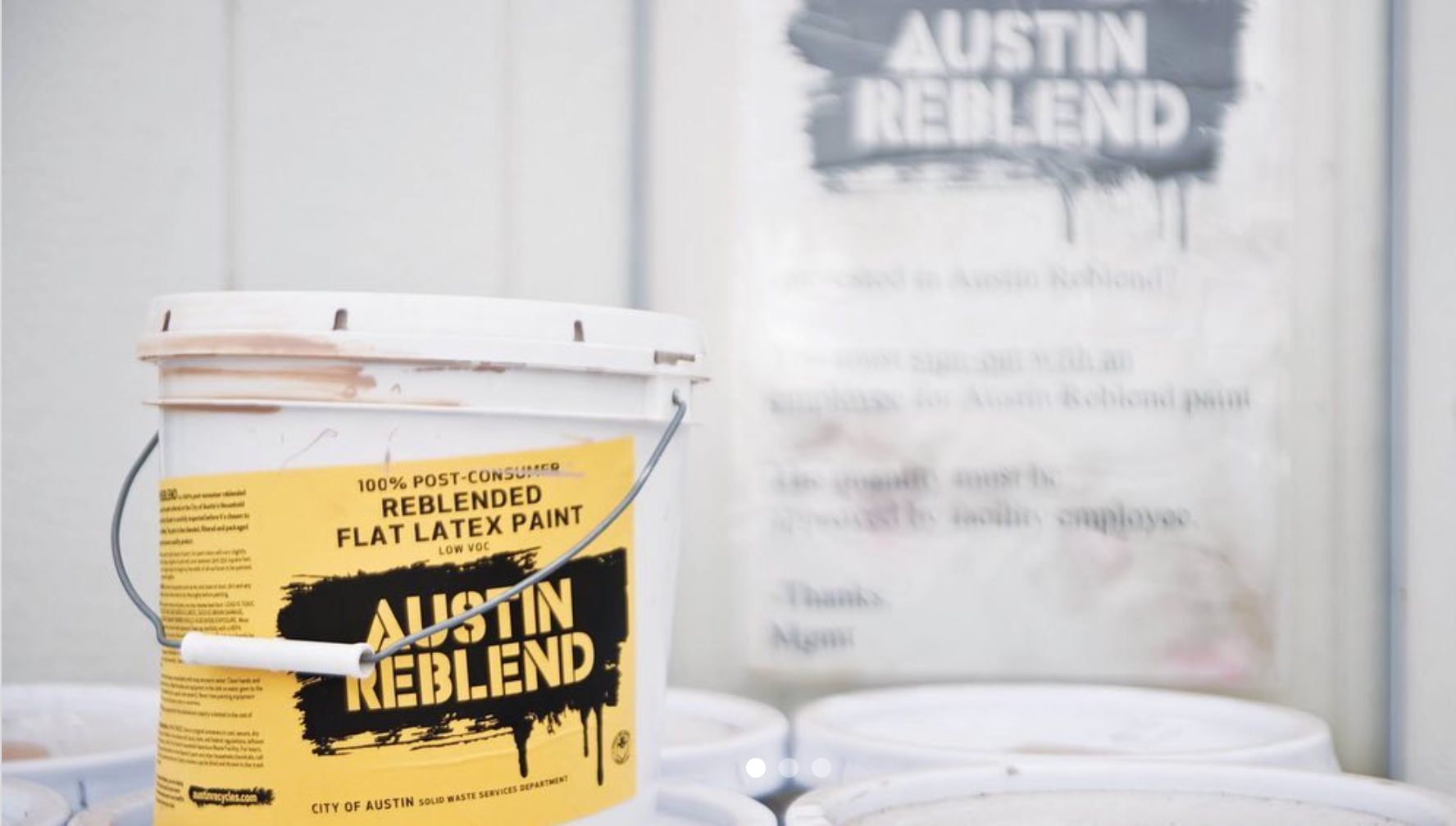A five-gallon bucket of Austin Reblend paint with the label showing.
