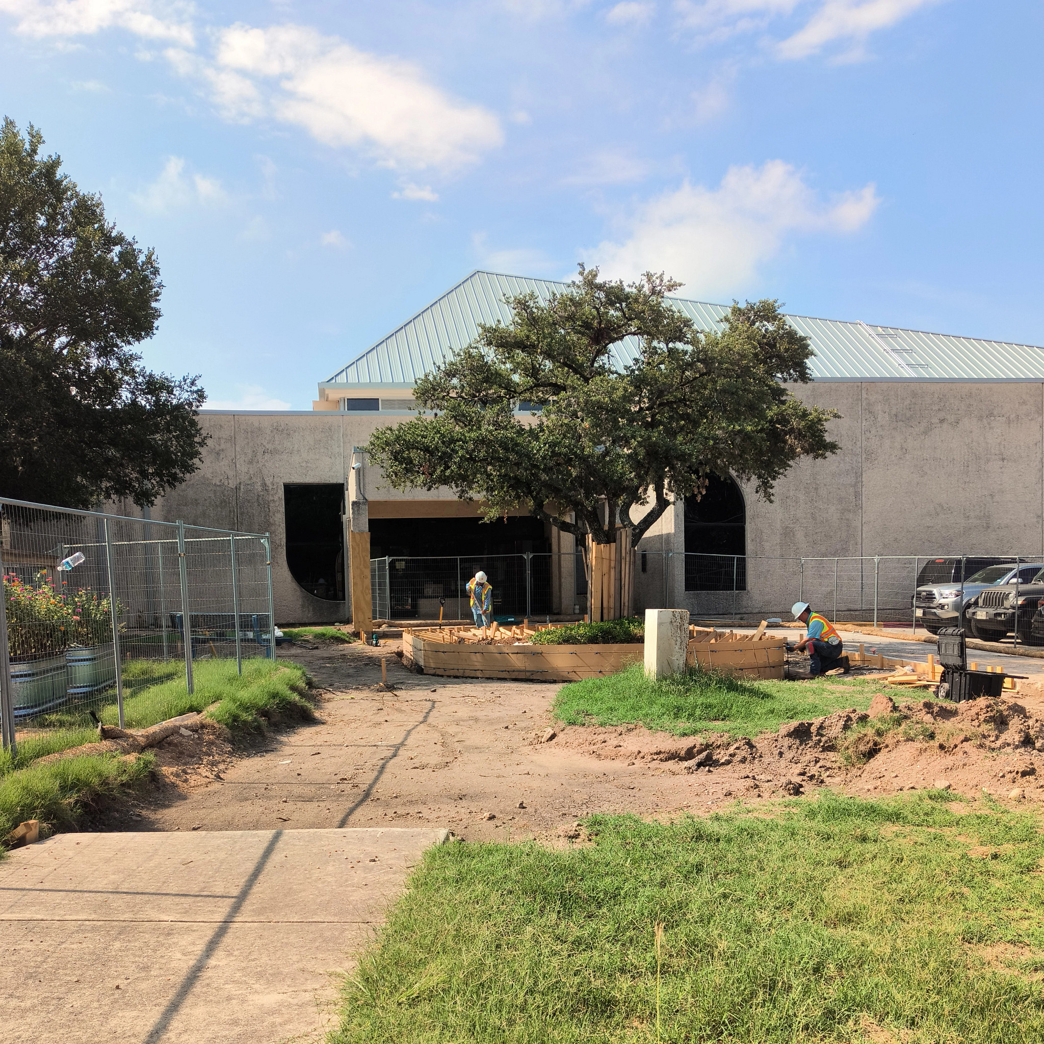 Entrance of Givens Recreation Center showing space for updated sidewalk and community garden space