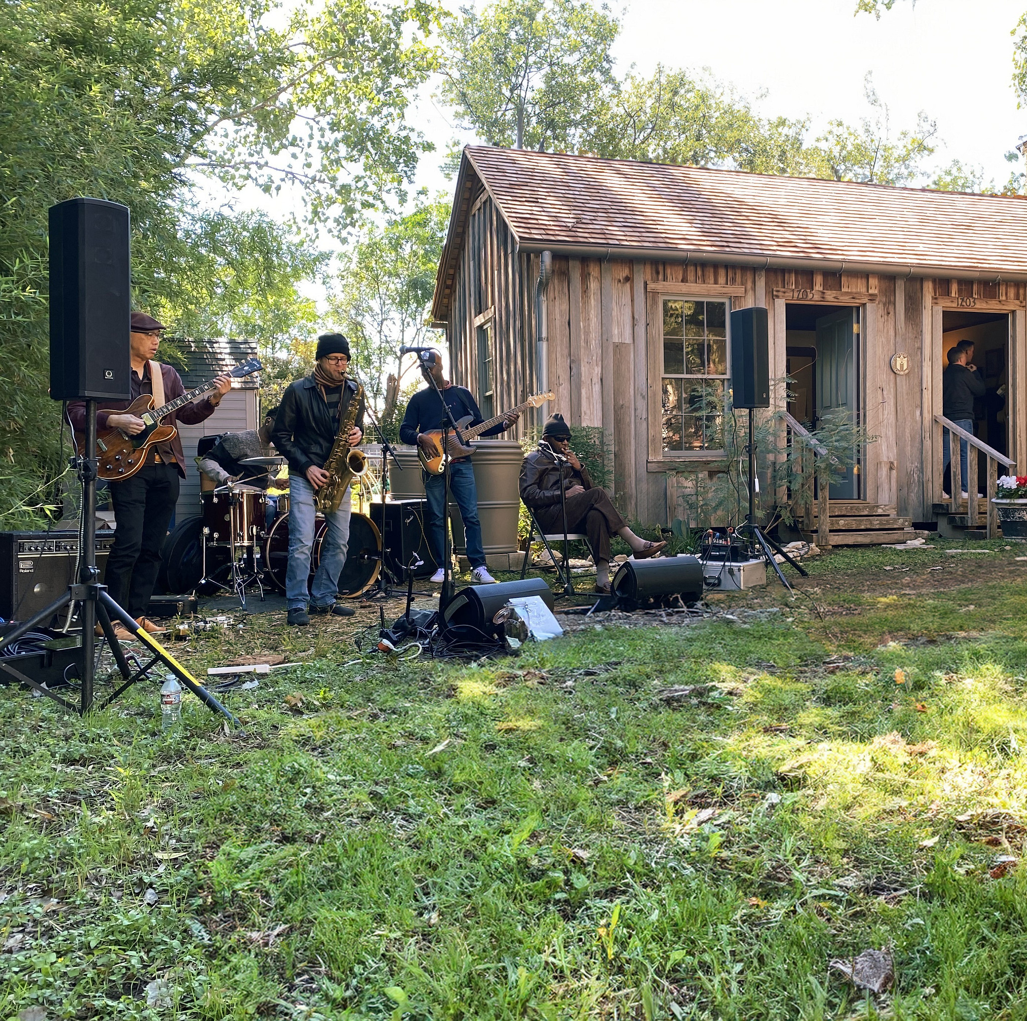 Soul Man Sam and his band performing music live in front of the Hezikiah Haskell House.