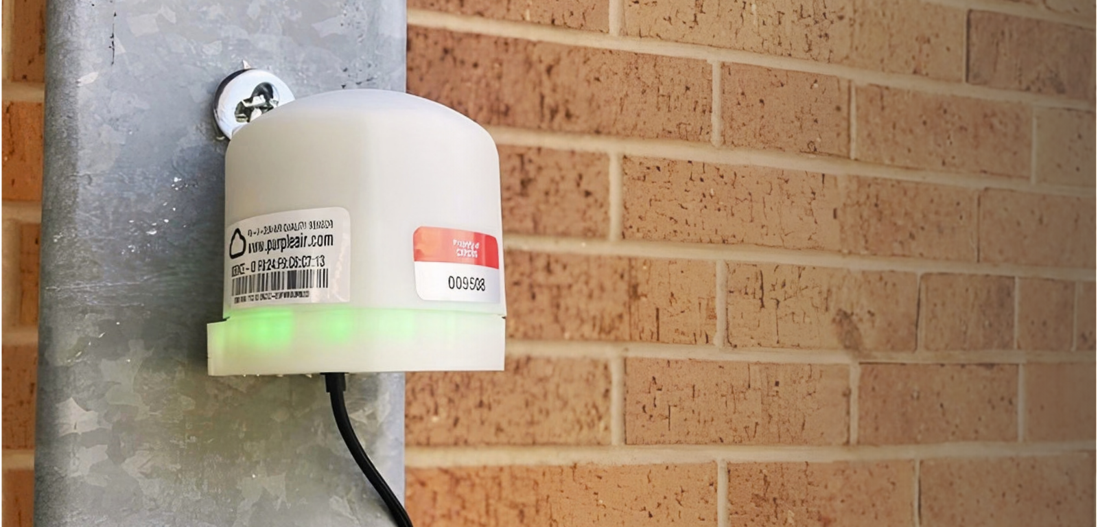 A Purple Air sensor deployed at an AISD campus.