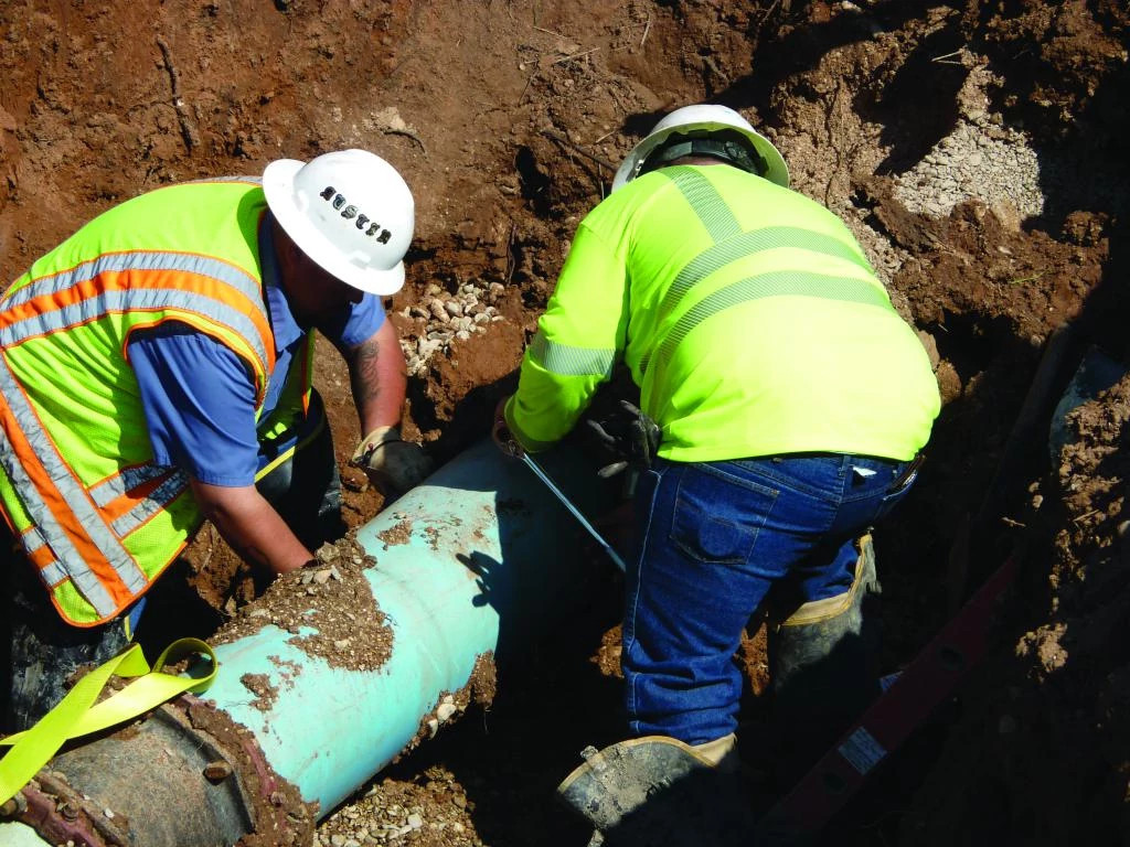 Austin Water pipeline technicians excavate a worksite.