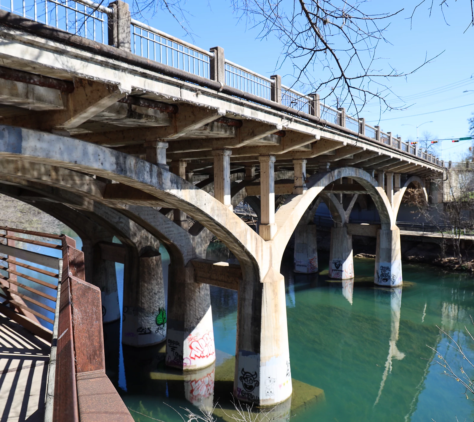 View of the existing Barton Springs Road Bridge from the trail that crosses underneath the bridge.